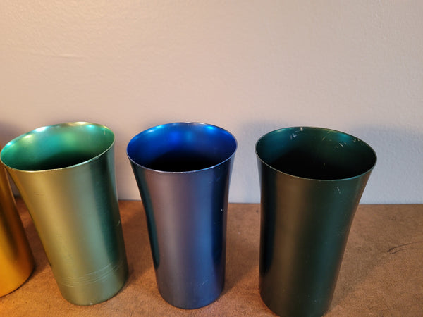 Set of 5 metal drinking vessels.